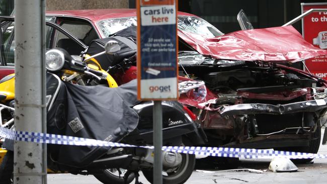 The wreckage of the car following the city rampage. Picture: David Caird