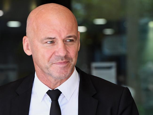 Former NSW Detective Gary Jubelin leaves the Downing Centre Local Court in Sydney, Friday, February 14, 2020. (AAP Image/Peter Rae) NO ARCHIVING