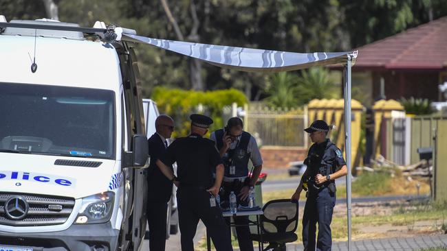 Police at the scene of the alleged murder at Paralowie. Picture: Roy VanDerVegt