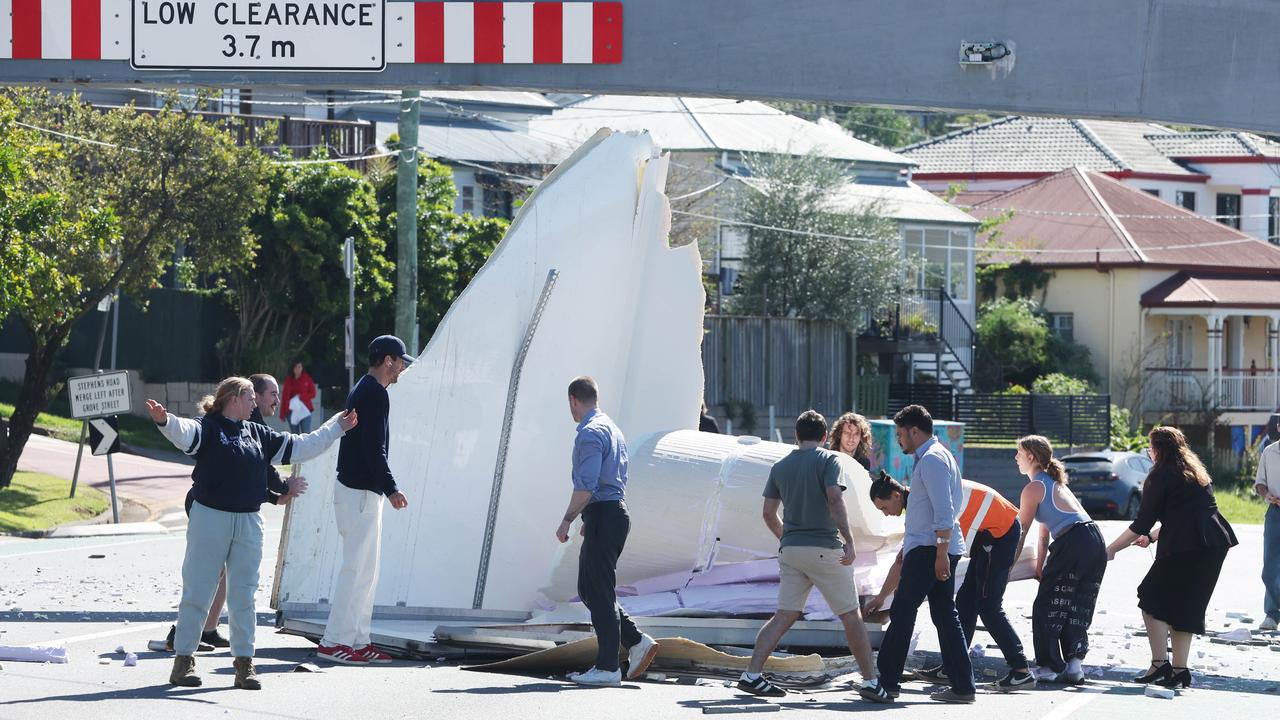 Truck disintegrates after slamming into bridge on busy Brisbane road