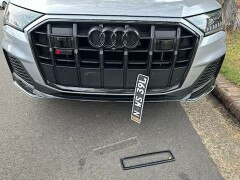 Another car’s damaged numberplate. Picture: Christian Anstey