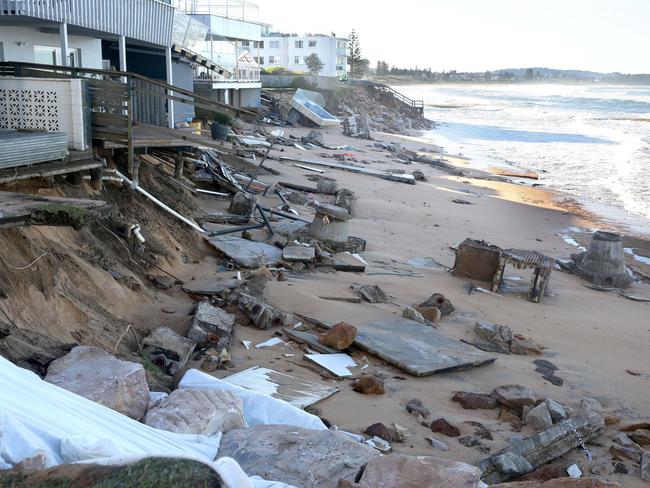 Devastation with broken sewerage, swimming pool etc on the beach destroyed at Collaroy where houses have been eaten by the ocean. Picture: Martin Lange.