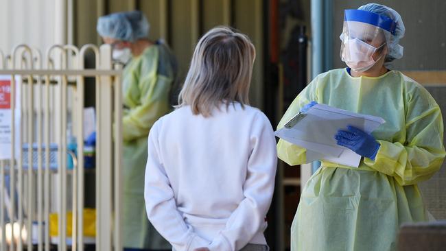 People wait outside the Tanunda War Memorial Hospital – a dedicated COVID-19 testing clinic in the Barossa Valley. Picture: AAP Image/David Mariuz