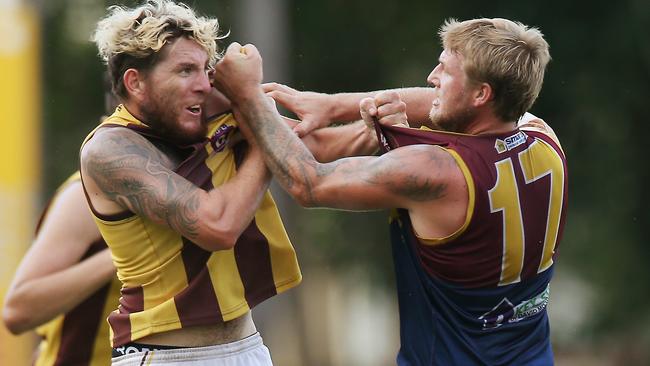 Things became heated between the Hawks' Michael Martyn and the Lion's Josh Taranto during the third quarter. PICTURE: BRENDAN RADKE.