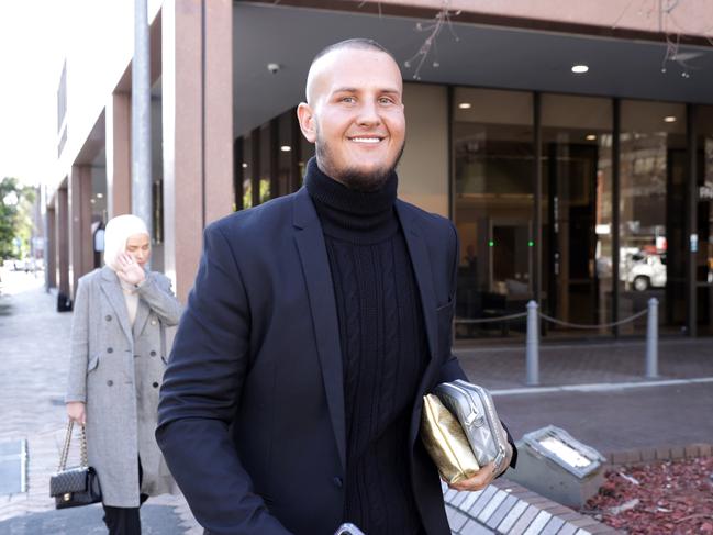 Trent Jeske leaves Parramatta Local Court with his partner Jade Heffer after being sentenced for driving in Jerilderie in rural NSW on April 23, 2024 after a licence application was refused. Jane Dempster/Daily Telegraph.