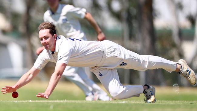 Declan Highgate dives for the ball for Greenvale Kangaroos. Picture: Josh Chadwick