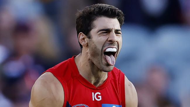 MELBOURNE , AUSTRALIA. March 23 , 2024.  Hawthorn vs Melbourne at the MCG .  Christian Petracca of the Demons  celebrates a 3rd quarter goal   . Pic: Michael Klein