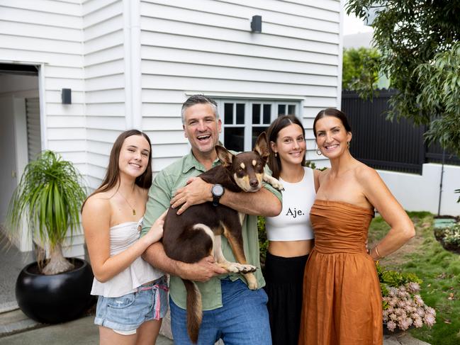 Dennis Scott with wife Mia, daughters Poppy, 13, Matilda, 16, and dog Frankie. Picture by Luke Marsden.