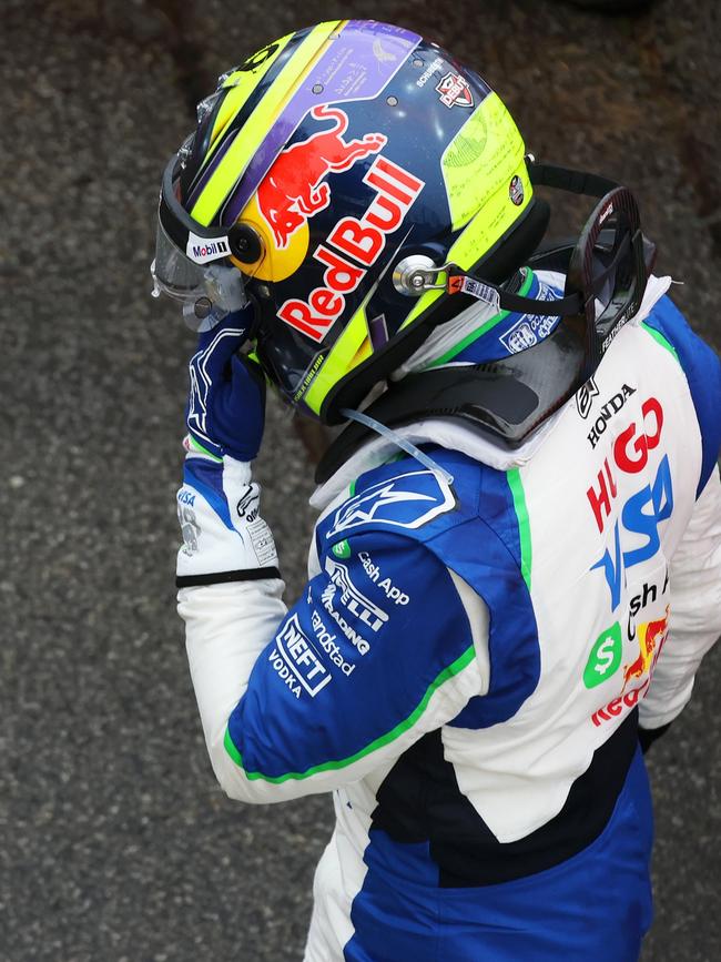 Isack Hadjar was distraught after crashing his car on the formation lap. (Photo by Mark Thompson/Getty Images)