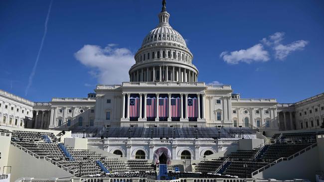 American flags are displayed on the West Front of the US Capitol building ahead of Donald Trumps inauguration. Picture: Mandel Ngan / AFP