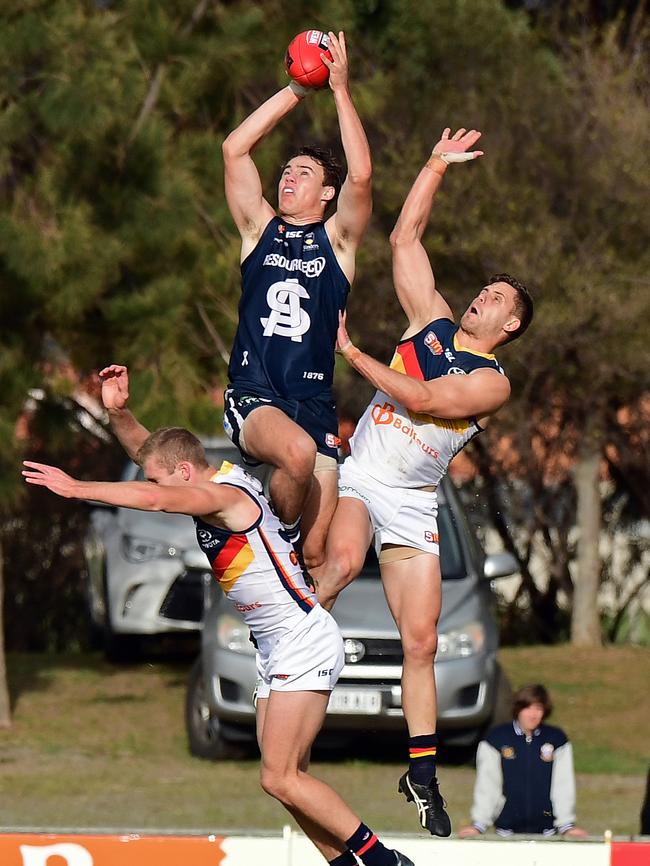 South's Jackson Elmes takes a flying attempt at a mark against the Crows. Picture: Tom Huntley