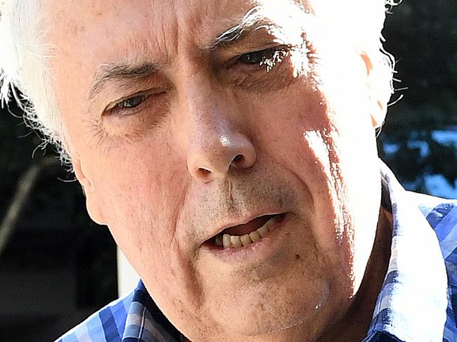 Businessman and former federal MP Clive Palmer arrives holding a sick-bag to the Federal Court in Brisbane, Tuesday, May 16, 2017. Mr Palmer appeared at the court  to face further questioning  by the liquidators of the collapsed Queensland Nickel company.  (AAP Image/Dave Hunt) NO ARCHIVING