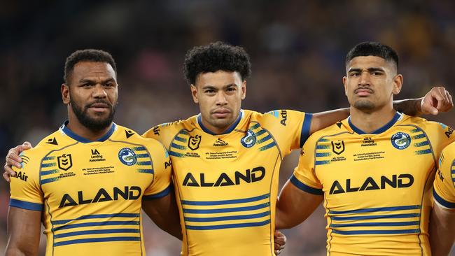 Maika Sivo and Waqa Blake of the Eels line up for the national anthem.