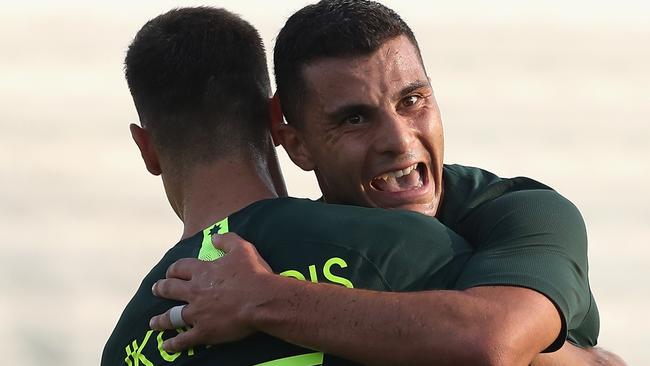 DUBAI, UNITED ARAB EMIRATES - DECEMBER 30:  Chris Ikonomidis and Andrew Nabbout of Australia celebrates their second goal during the International Friendly match between Australia and Oman at Maktoum Bin Rashid Al Maktoum Stadium on December 30, 2018 in Dubai, United Arab Emirates.  (Photo by Francois Nel/Getty Images)