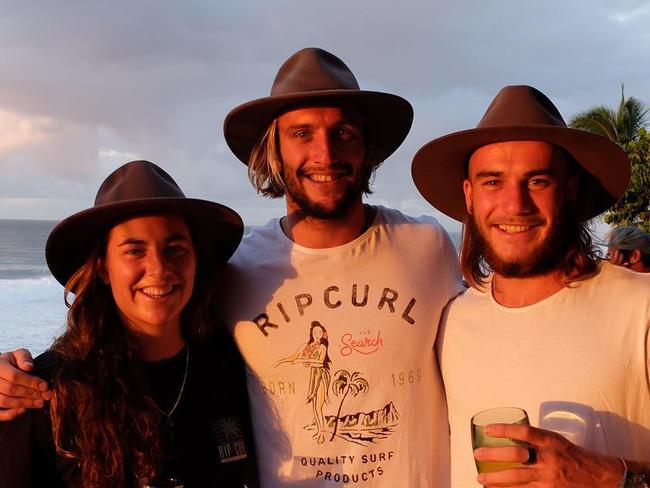 World champion surfer Tyler Wright and brothers Owen and Mickey.