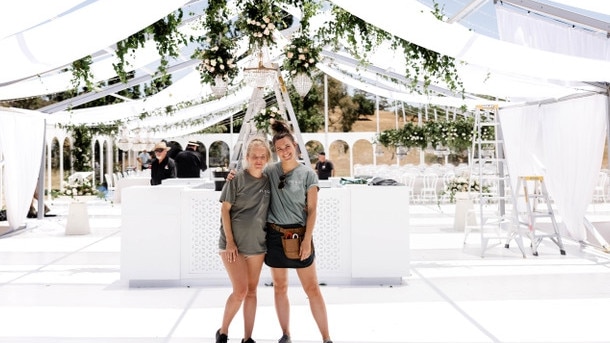 Hygge’s Rachel Evans and Lucy Temme inside the reception marquee at Ashton Hurn and Adam Howard’s wedding. Picture: Supplied