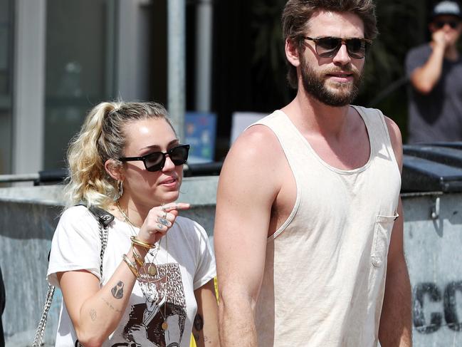 Cyrus and Hemsworth at the Gold Coast during a trip to Australia to see the Hemsworth clan in January 2018. Picture: Nigel Hallett