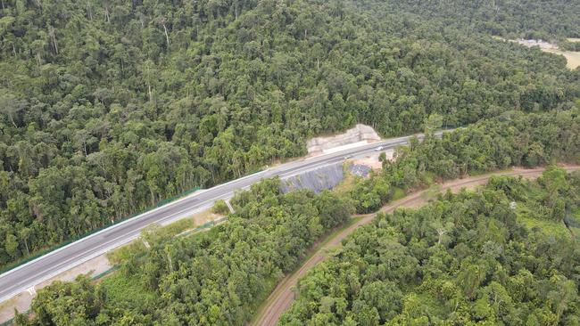 An aerial photo taken in 2021 showing the Bruce Highway at Smiths Gap. Works on an overtaking lane and fauna crossing have been ongoing for longer than expected. Picture: Arun Singh Mann