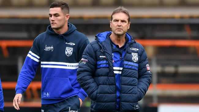 Bulldogs halfback Kyle Flanagan with interim coach Mick Potter. Picture: NRL Images