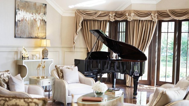 Living area with grand piano at Hermes Estate, Bellingen.