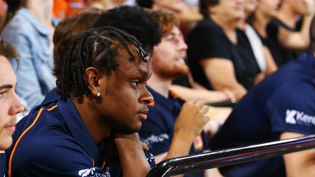 Tamuri Wigness watches the National Basketball League (NBL) match between the Cairns Taipans and the Adelaide 36ers, held at the Cairns Convention Centre, from behind the Taipans bench. PICTURE: BRENDAN RADKE.