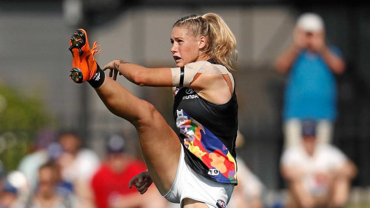 FLYING HIGH: Tayla Harris of the Carlton Blues kicks the ball. This image has quickly become one of the most iconic in Australian sporting history. Picture: Michael Willson/AFL Media