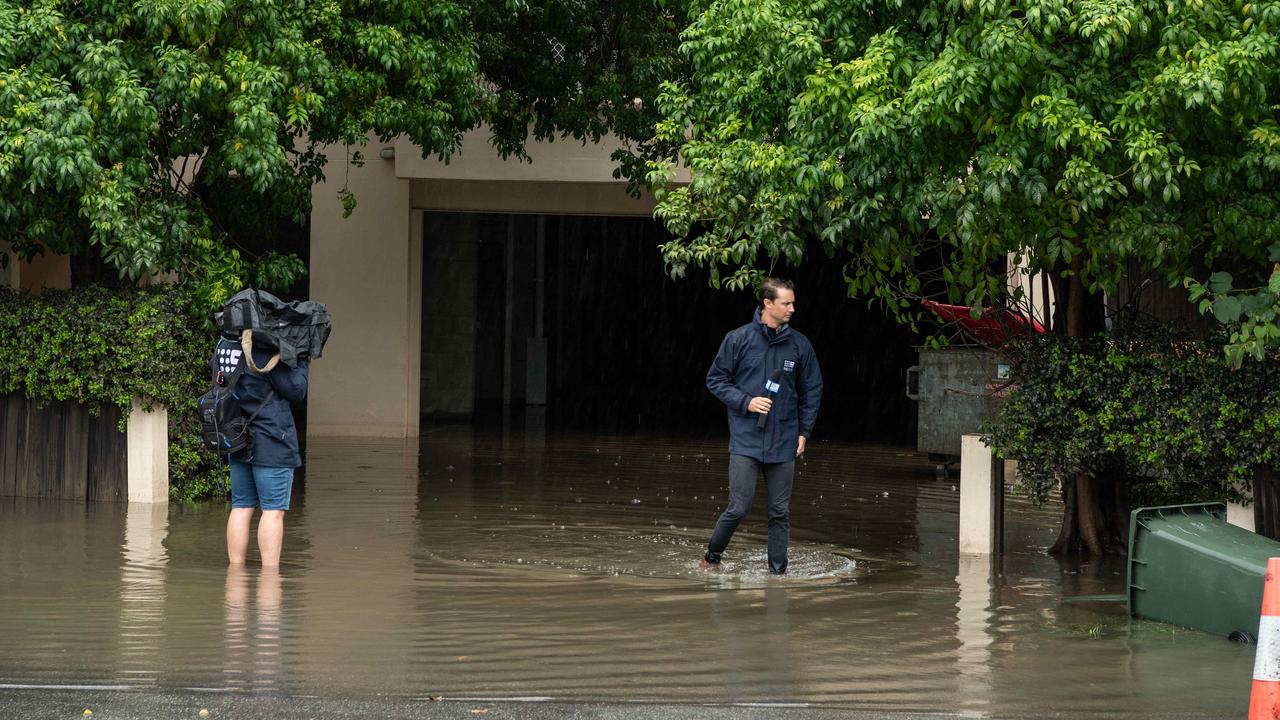 Localised flooding on Lang Parade, Milton. Picture: Brad Fleet