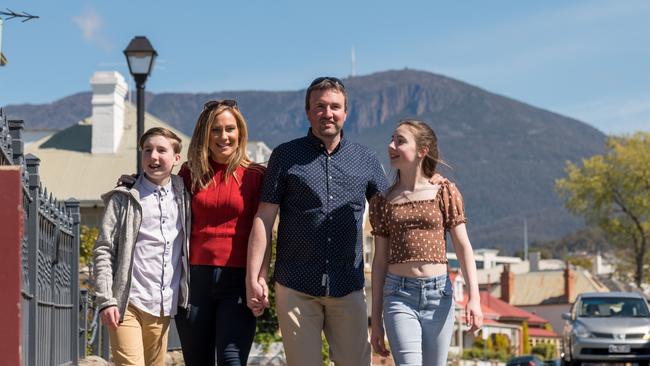 Kristie Johnston with husband Ben and children Harry and Lucy.