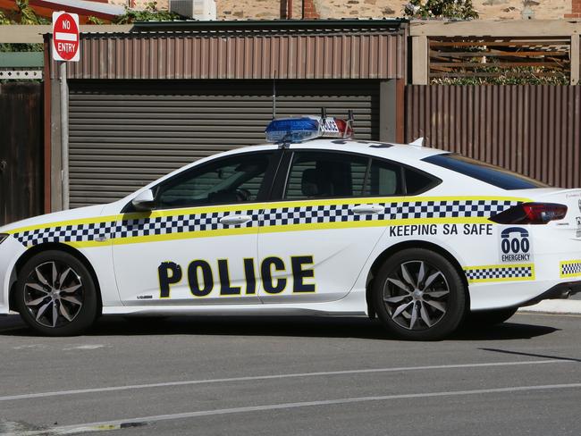 Generic Image A parked South Australian Police Car at a Unit fire in Glenelg, S.A. (AAP/Emma Brasier)