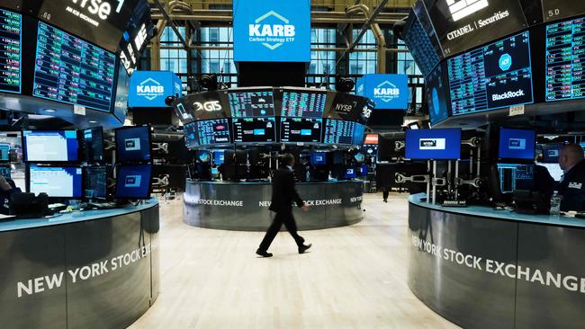 Traders work on the floor of the New York Stock Exchange. Picture: AFP