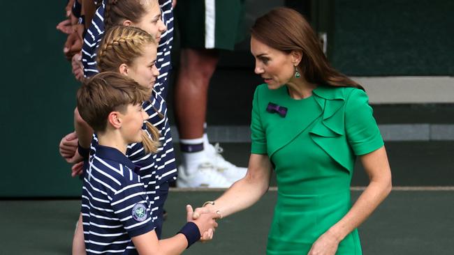 LONDON, ENGLAND – JULY 16: Catherine, Princess of Wales talk to the ball kids following the Men's Singles Final between Novak Djokovic of Serbia and Carlos Alcaraz of Spain on day fourteen of The Championships Wimbledon 2023 at All England Lawn Tennis and Croquet Club on July 16, 2023 in London, England. (Photo by Patrick Smith/Getty Images)