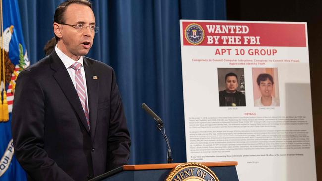 US Deputy Attorney-General Rod Rosenstein announces fresh indictments of Chinese government hackers who allegedly targeted scores of companies. Pic: AFP