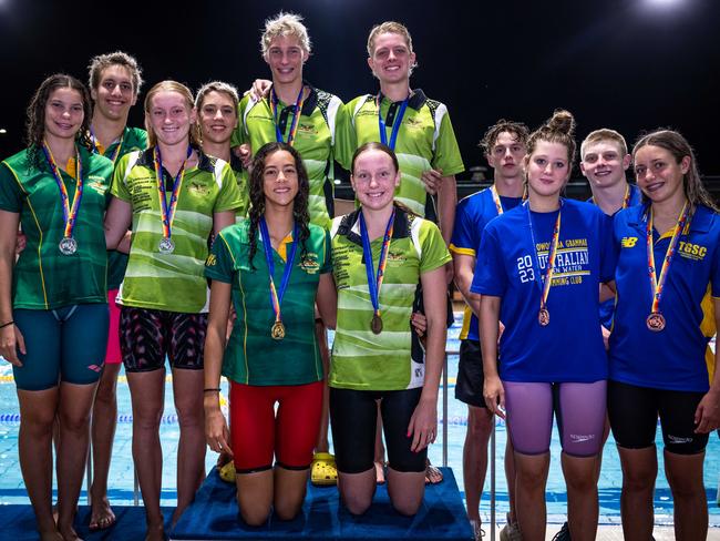 Swimmers from the 2023 champs atop the podium. Picture: SwimmingNT.