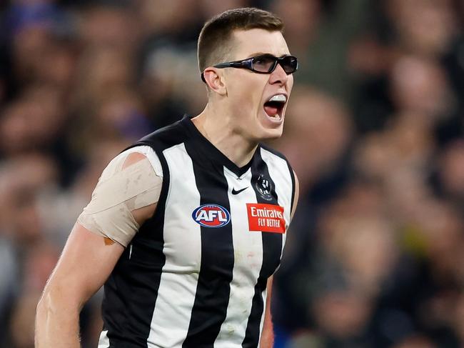 MELBOURNE, AUSTRALIA - SEPTEMBER 22: Mason Cox of the Magpies celebrates a goal during the 2023 AFL First Preliminary Final match between the Collingwood Magpies and the GWS GIANTS at Melbourne Cricket Ground on September 22, 2023 in Melbourne, Australia. (Photo by Dylan Burns/AFL Photos via Getty Images)