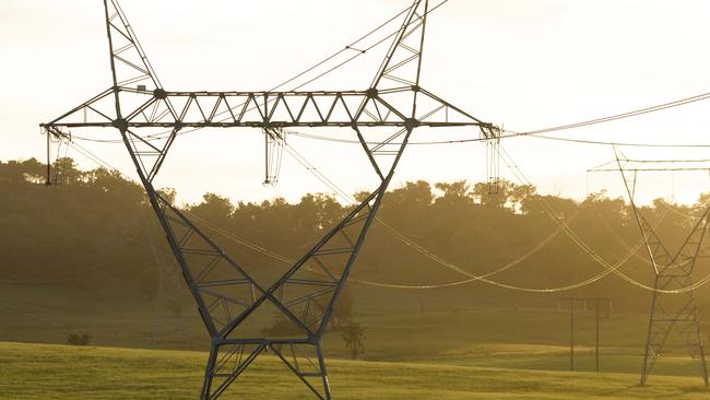 THE AUSTRALIAN. Transmission power lines near the Stubbo solar farm development. Residents of Mudgee and surrounds have concerns about a number of developments that are part of the Central-West Orana renewable energy zone. 09/02/2024. Picture by Max Mason-Hubers