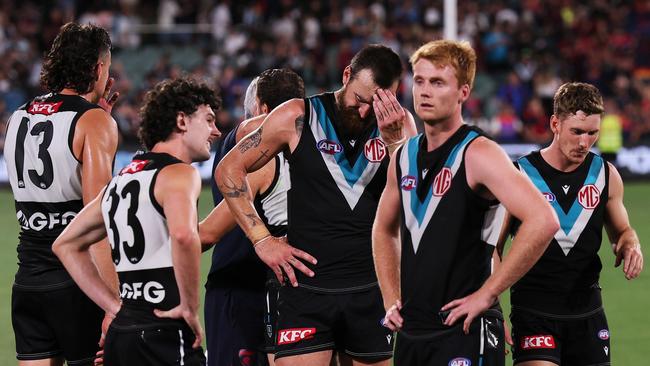 ADELAIDE, AUSTRALIA - MARCH 30: Charlie Dixon of the Power reacts after their loss during the 2024 AFL Round 03 match between the Port Adelaide Power and the Melbourne Demons at Adelaide Oval on March 30, 2024 in Adelaide, Australia. (Photo by James Elsby/AFL Photos via Getty Images)