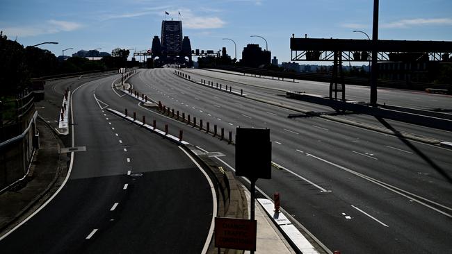 Empty roads on approach to the Sydney Harbour Bridge in Sydney. Picture: AAP