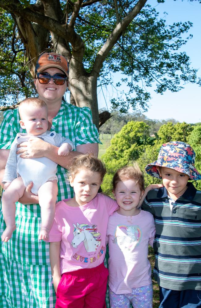 Archie and his mother Lucy Dugan, Annabelle Fletcher, Olivia Dugan and Charlie Fletcher supporting their Downlands brother and cousin player Jimmy Fletcher. Picture: Bev Lacey