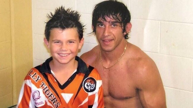 A young Jake Clifford meets his idol Johnathan Thurston.