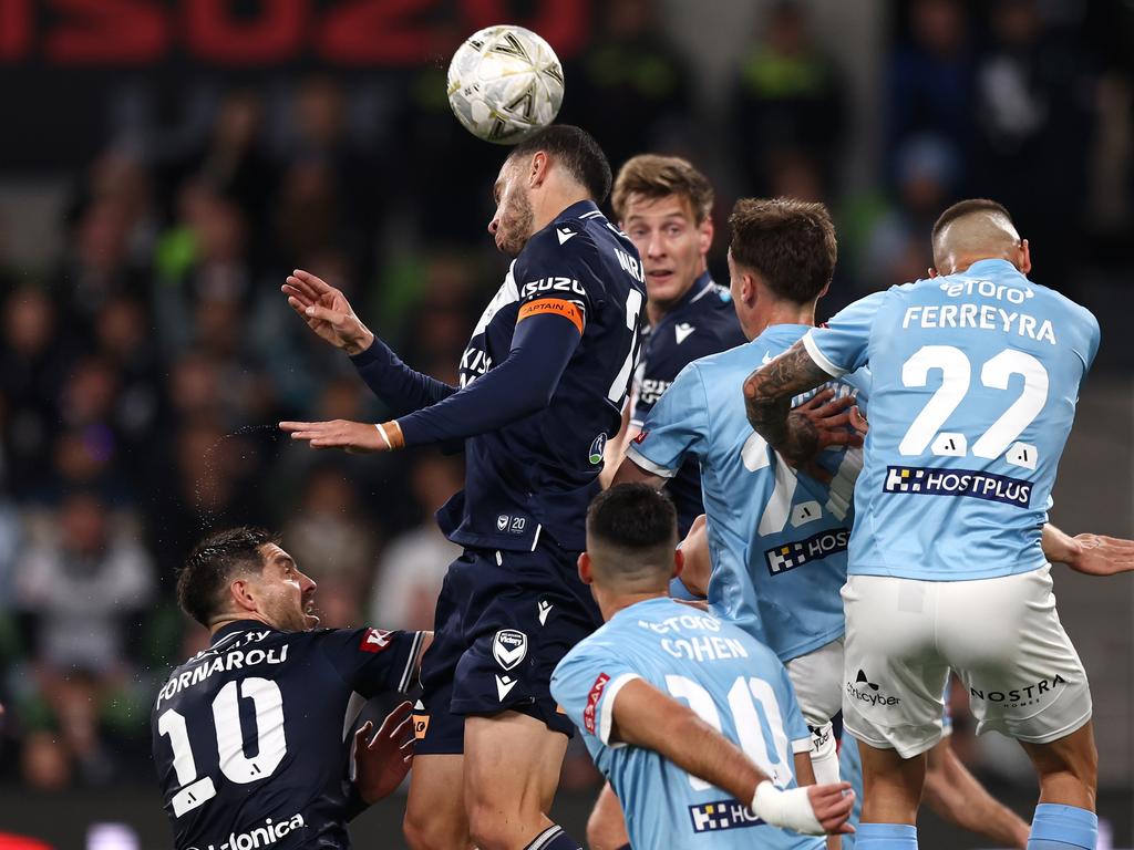 Roderick Miranda wins the header in heavy traffic. Picture: Getty Images