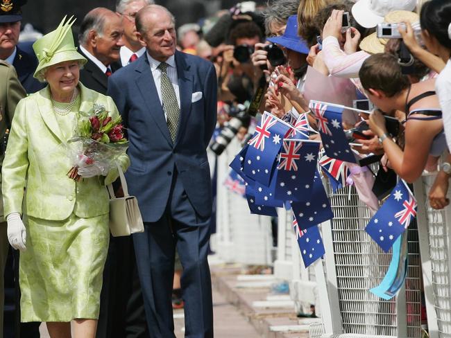 Her Majesty Queen Elizabeth II and His Royal Highness Prince Philip greet members of the public at the Sydney Opera House on March 13, 2006, during a five-day visit to Australia where she officially opened the Commonwealth Games in Melbourne. Picture: Getty Images