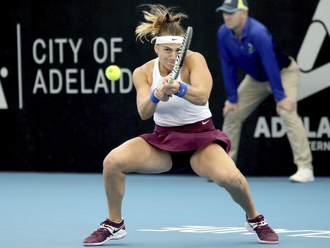 Belarusian Aryna Sabalenka plays a shot against Ukrainian Dayana Yastremska during their Adelaide International tennis match in Adelaide, Friday, Jan. 17, 2020. (AP Photo/James Elsby)