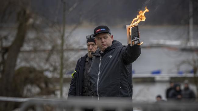 Right-wing politician Rasmus Paludan burns the Koran outside of the Turkish embassy in Stockholm, Sweden. Swedish authorities granted permission to a series of protests for and against Turkey amid the bid to join NATO.