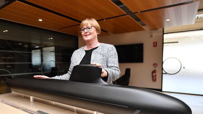 Federal Defence Minister Linda Reynolds poses next to a model of the French submarine ordered by Australia. Picture: AAP