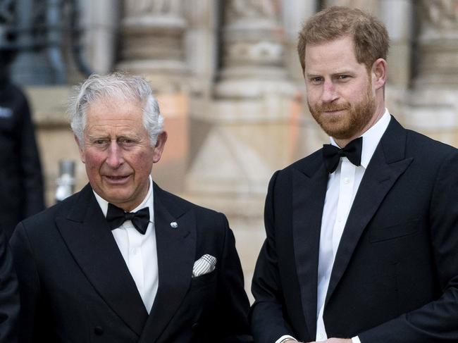 Prince Harry’s relationship with his father Prince Charles, left, is strained. Picture: AFP