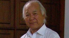 Senichiro Fujita attended the opening of the Darwin Memorial Uniting Church in 1960, where his father donated 77 bronze crosses to the church as a symbol of peace. The crosses were crafted from scrap salvaged during the Fujita salvage operation, and one is on display in Luke Gosling's Canberra office. Picture: Supplied