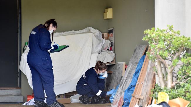 Police at the scene of a home in Northcote, where a woman was allegedly murdered on November 30 last year. Picture: NCA NewsWire / Nicki Connolly