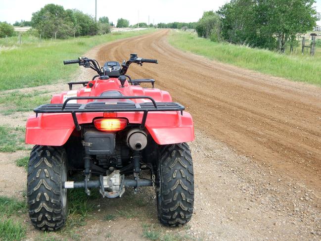 Two men injured after quad bike rolls