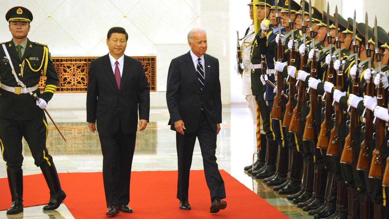 Then Chinese Vice President Xi Jinping escorts then US Vice President Joe Biden in 2011. The attack came just days after US President Joe Biden was sworn in.