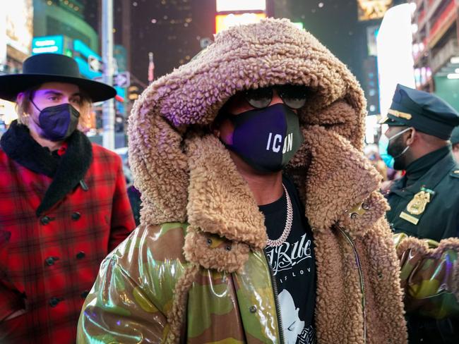 Rapper Ja Rule walks past the crowd after his performance at Times Square. Picture: Getty